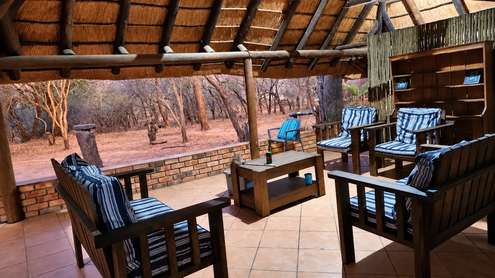 Seating beneath the thatched lapa
